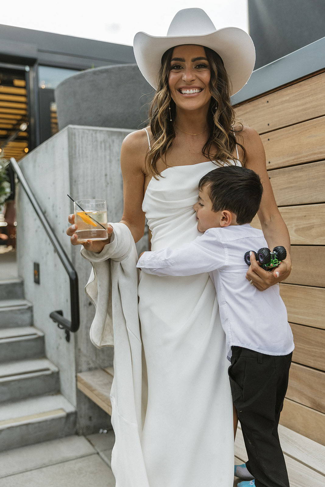 Bride, with her son