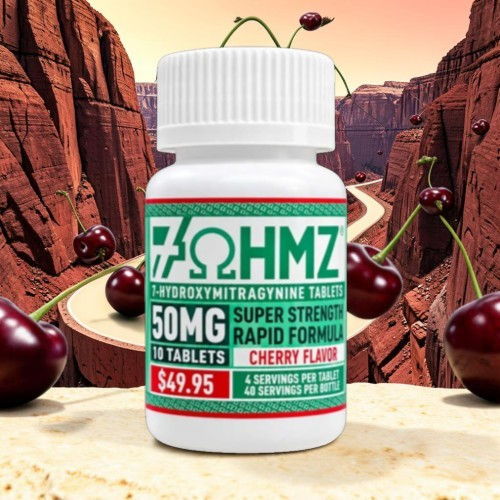 Bottle of tablets with cherry flavor against a scenic canyon background.