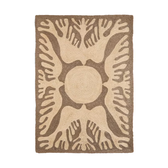 A decorative rug featuring abstract hand shapes surrounding a central circle.