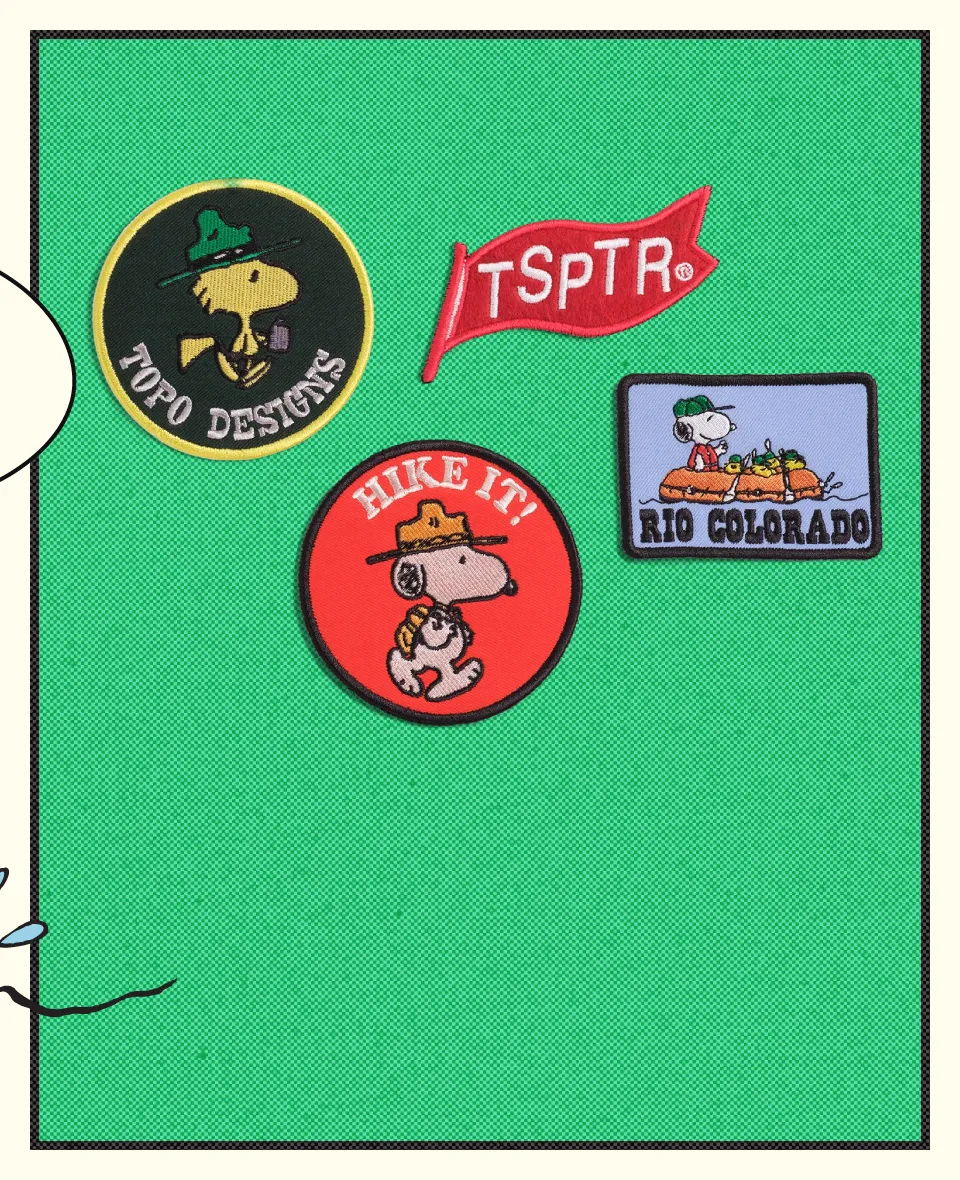 Three colorful patches on a green background featuring various designs and text.