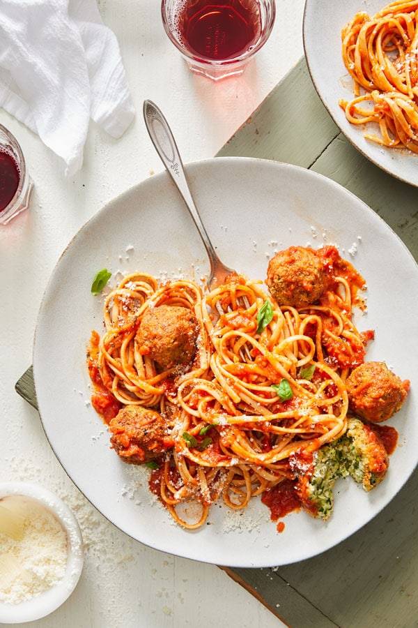 Zucchini meatballs in a red sauce with pasta