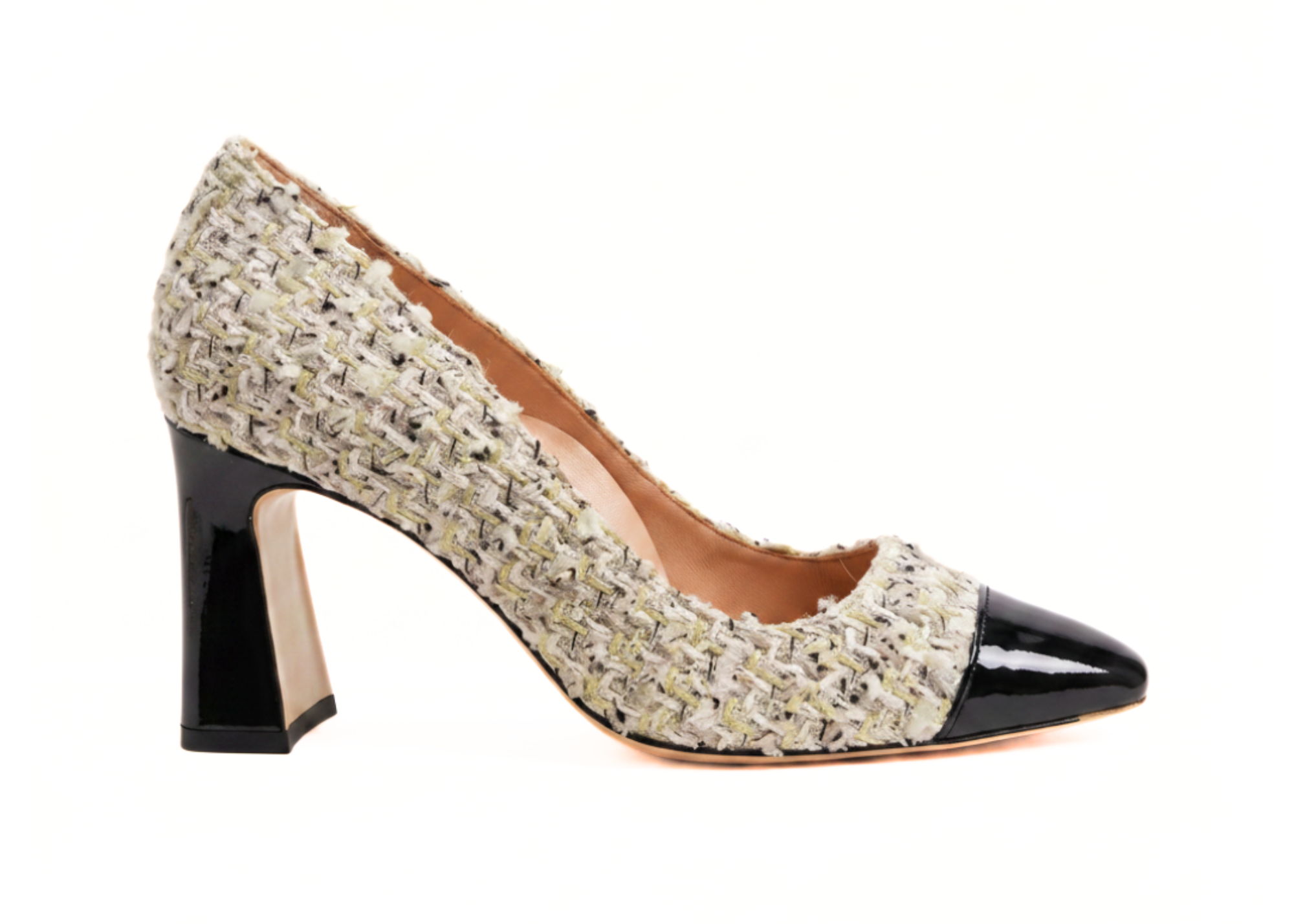 A stylish high heel shoe with a textured upper and black toe cap.
