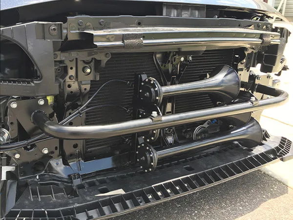 Front bumper removed two black Shocker XL horns mounted horizontally tubular support bar radiator Kristin's Subaru WRX gallery photo 3