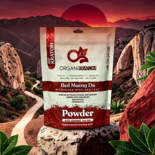 Red Maeng Da powder packaging with a mountainous sunset background.