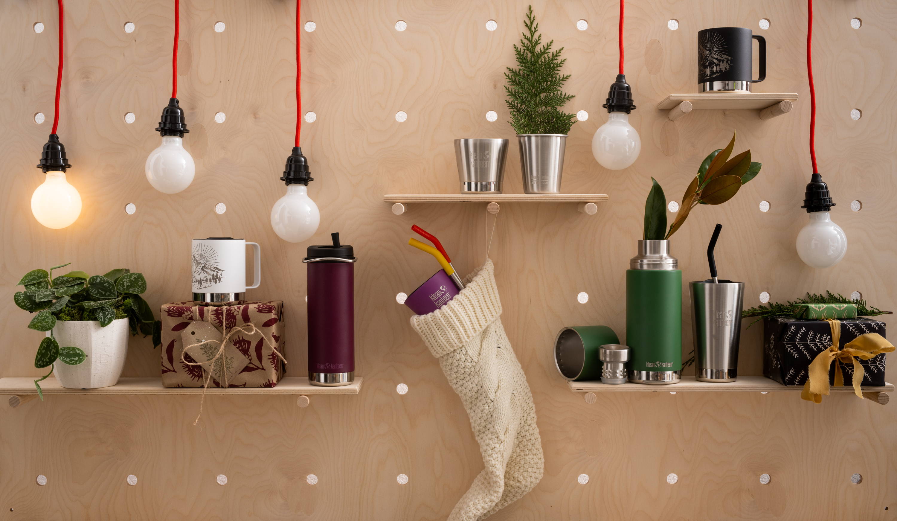 Klean Kanteen peg board display with stocking and several Klean Kanteen products