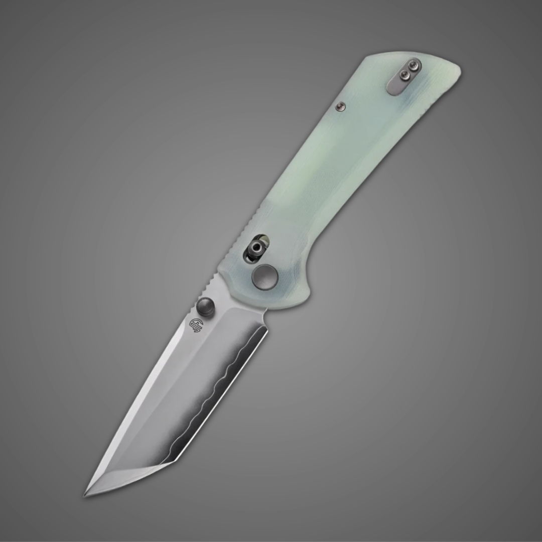 Folding knife with a silver blade and translucent handle against a gray background.