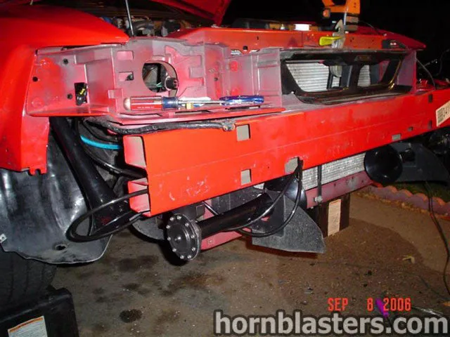 Wide exterior shot of 2003 Ford Mustang with Shocker XL train horn HornBlasters gallery photo 6