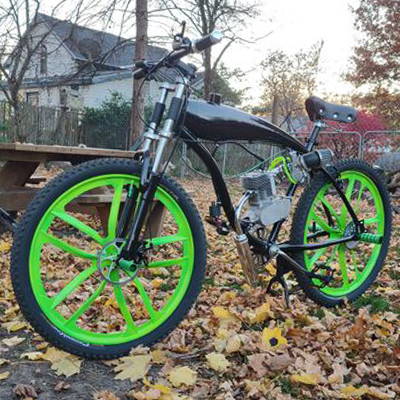 This is a 2-stroke motorized bike complete with saddle, wheel, and performance upgrades.