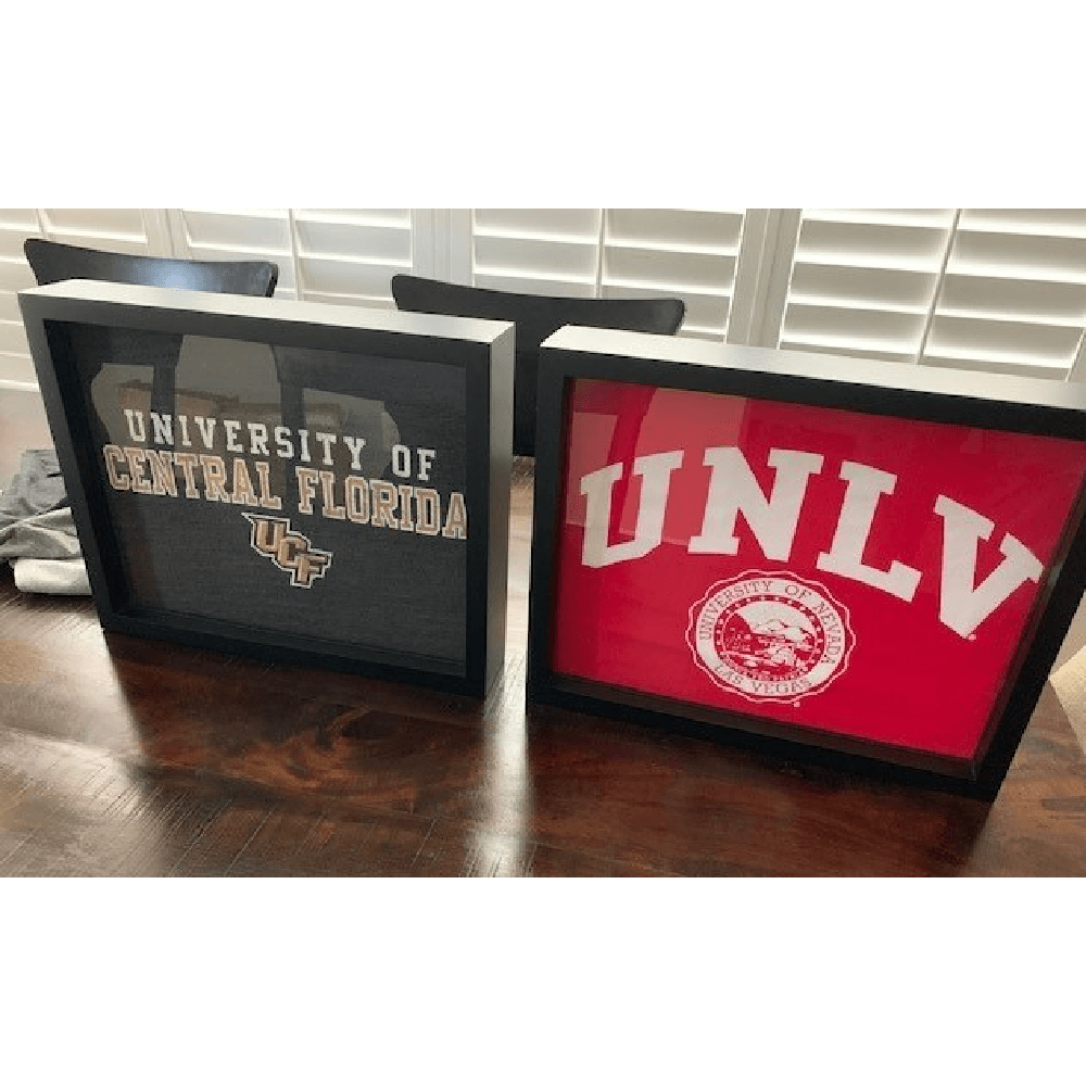 UNLV tee shirt and UCF tee shirts displayed in Shart Original T-Shirt Frames