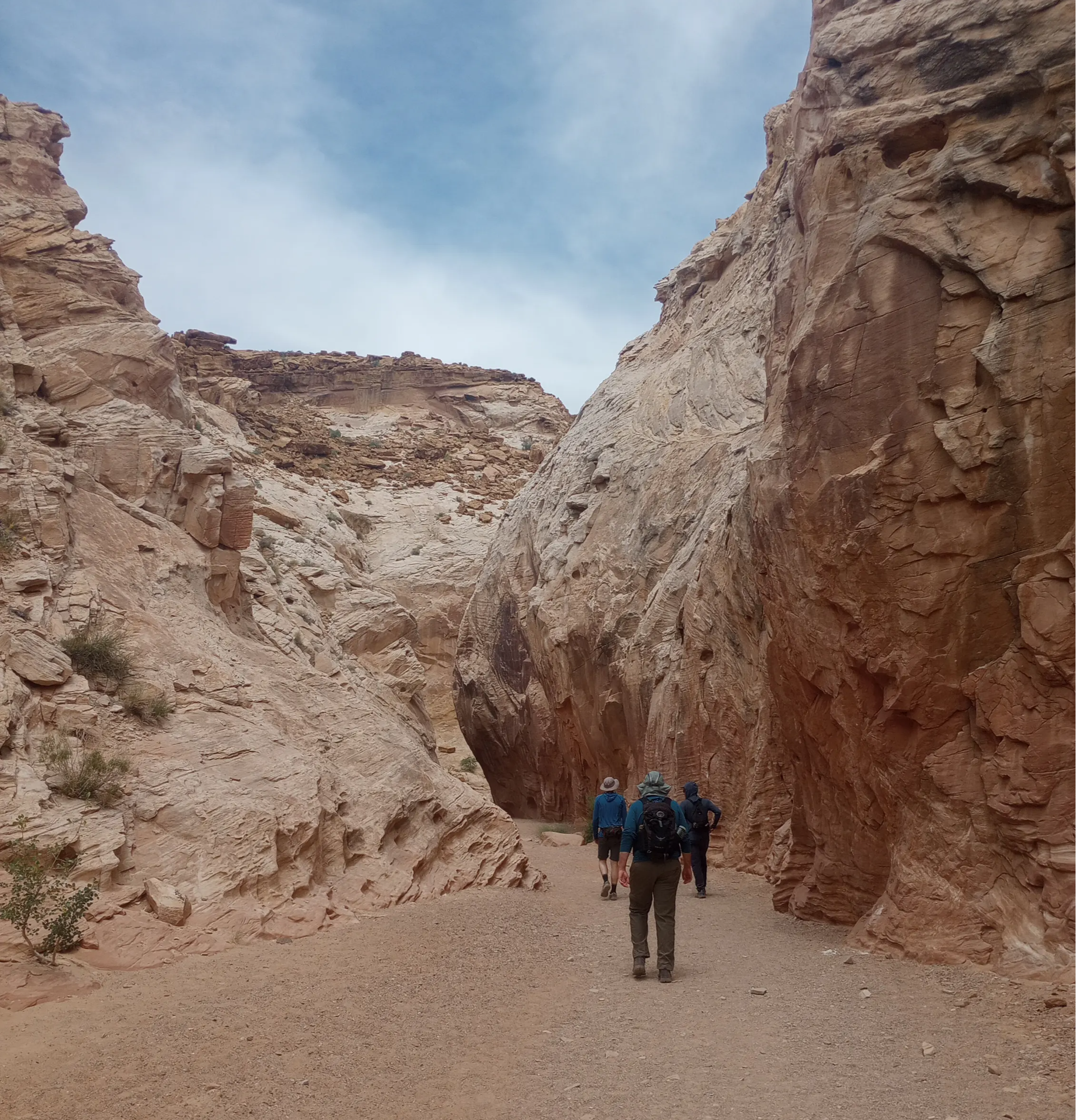 Hiking at the bottom of rock formations