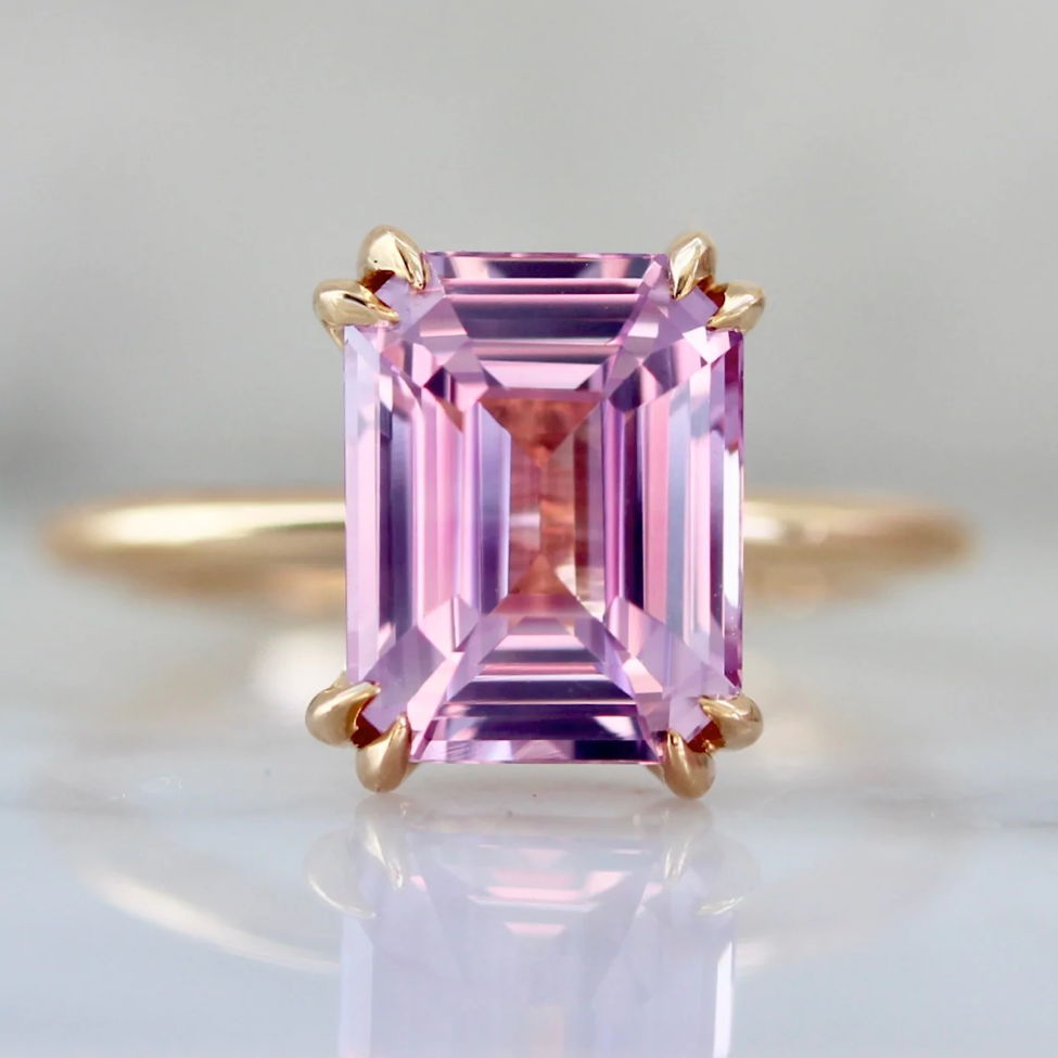 Emerald cut pink sapphire ring