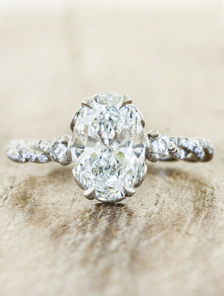 caption:Shown with 1.50ct oval diamond in platinum