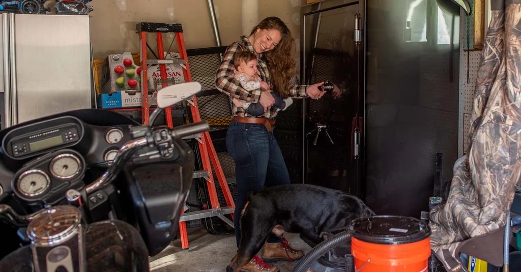 Wife and daughter opening a safe