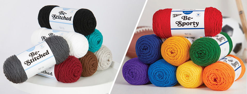 Assorted yarn skeins in various colors and packaging. Herrschners Be-Stitched and Be-Sporty Yarns