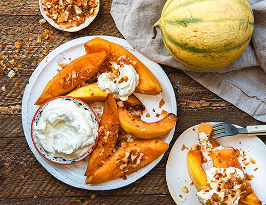 Roasted Charentais Melons with Coconut and Lime Whipped Cream