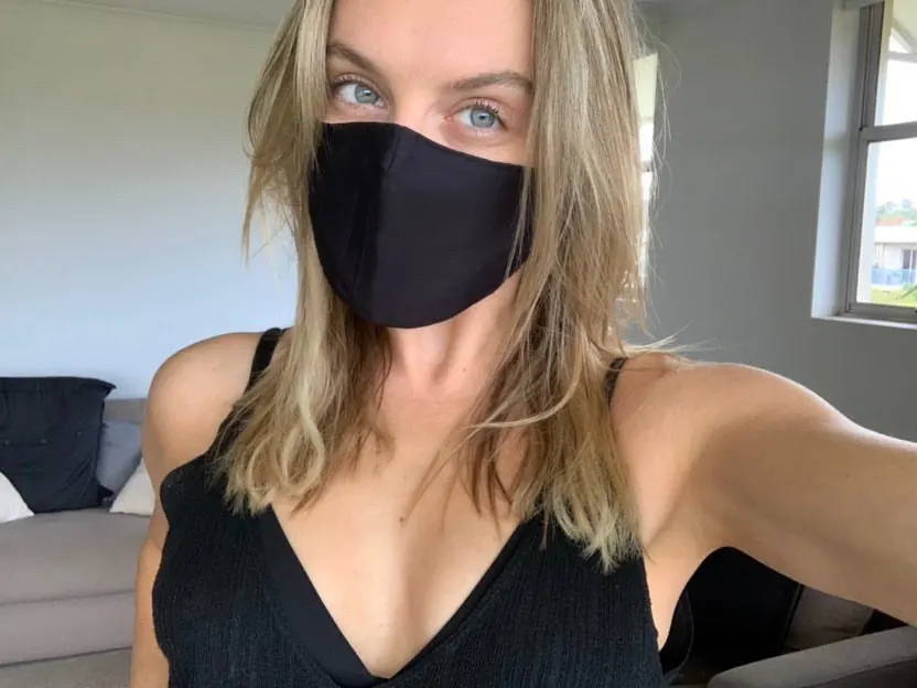 Woman in Darwin wearing face mask