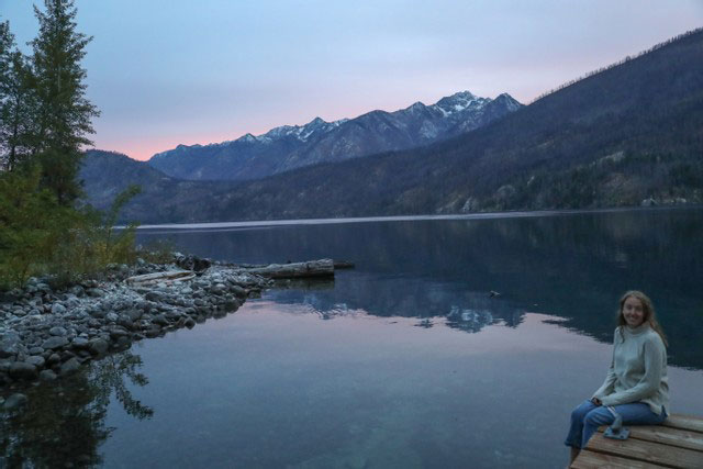 Katelynn sitting on dock at lake Chelan.