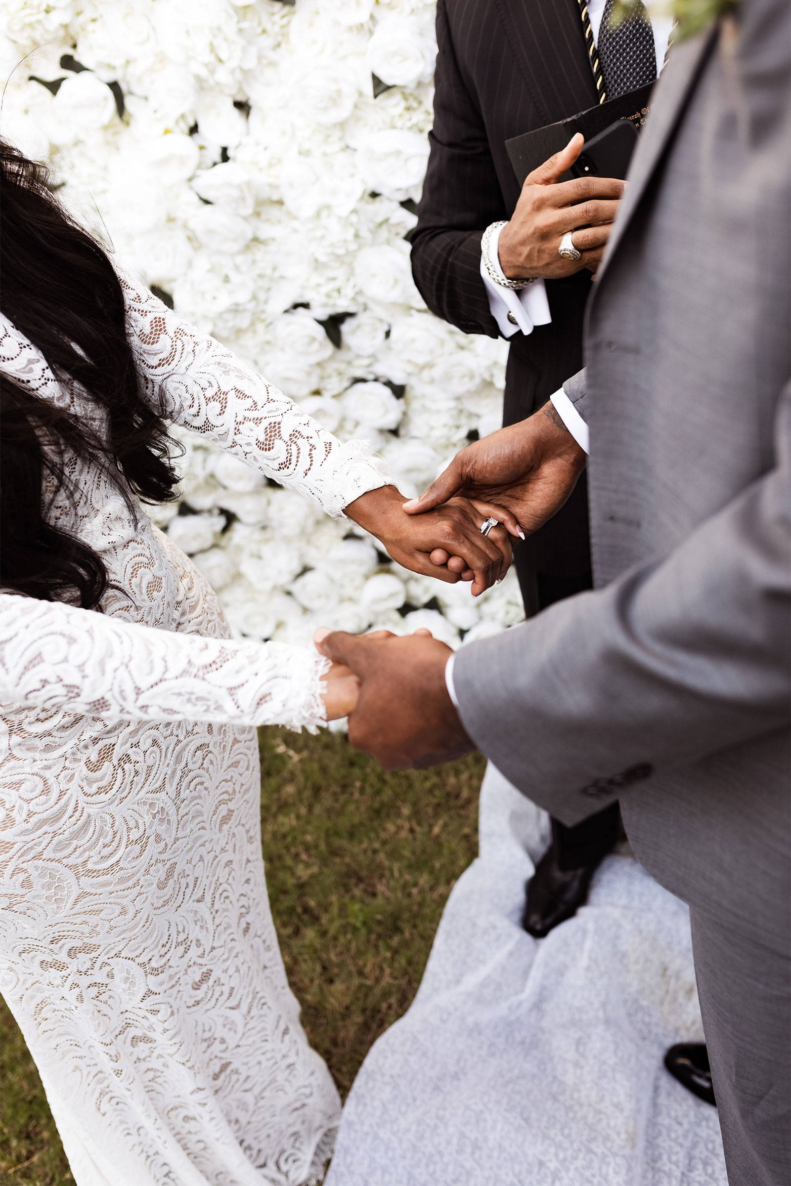 Holding hands at the wedding ceremony