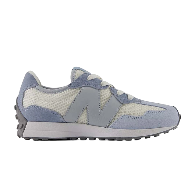 Light blue New Balance sneaker with mesh and suede materials.