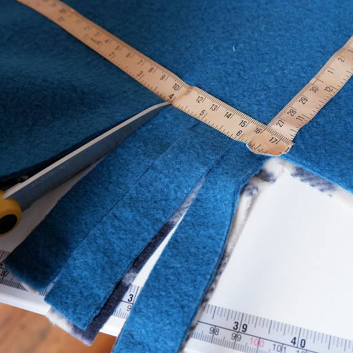Cutting fabric strips accurately for a tie blanket