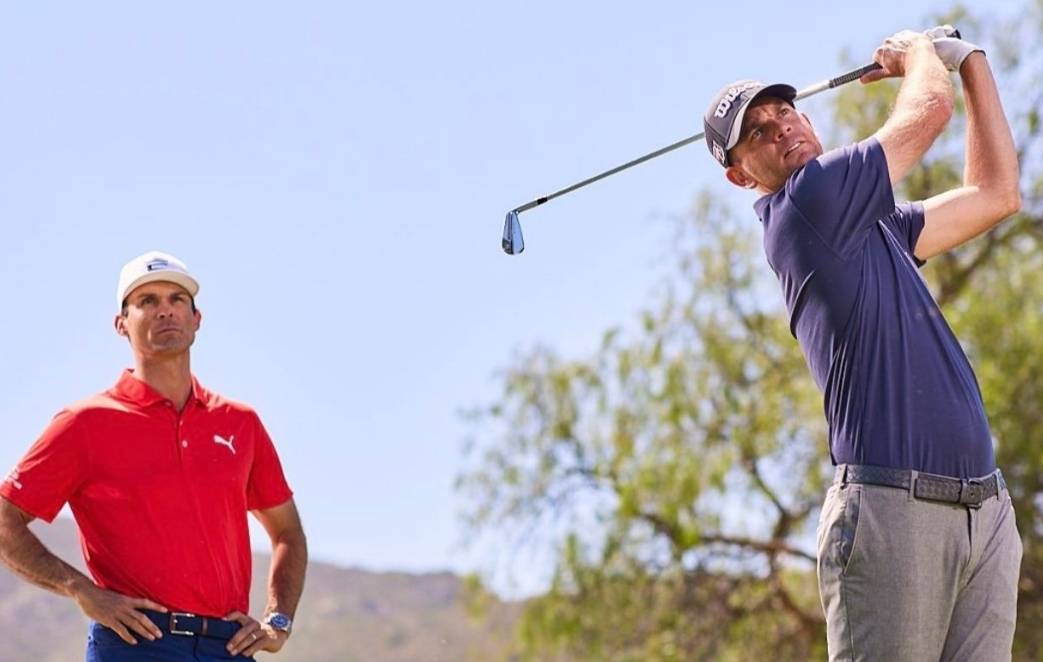 Chris Mayson watching a student's iron shot