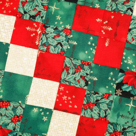 a quilt top in holiday colors