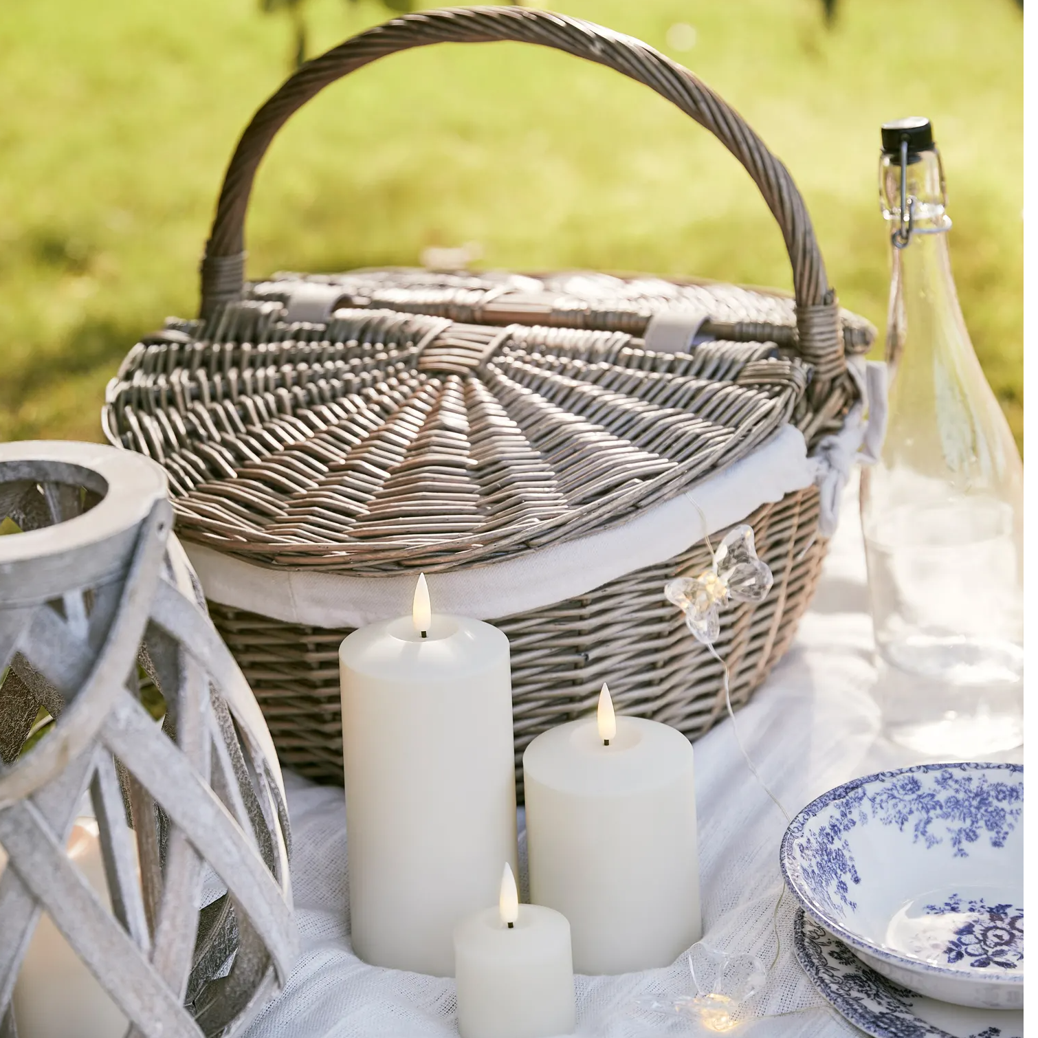 Picnic basket close up image featuring LED candles
