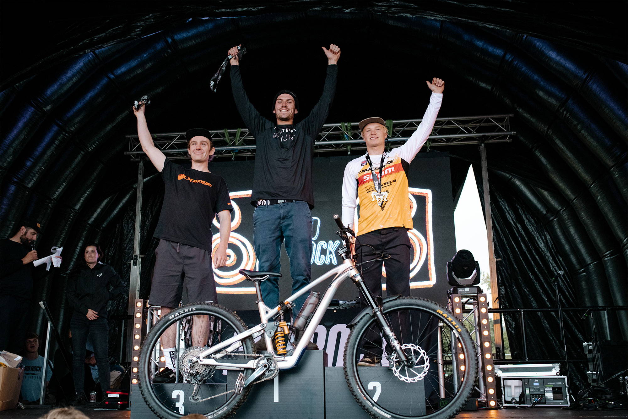 Privateer racer on a podium with the new Gen 2 bike