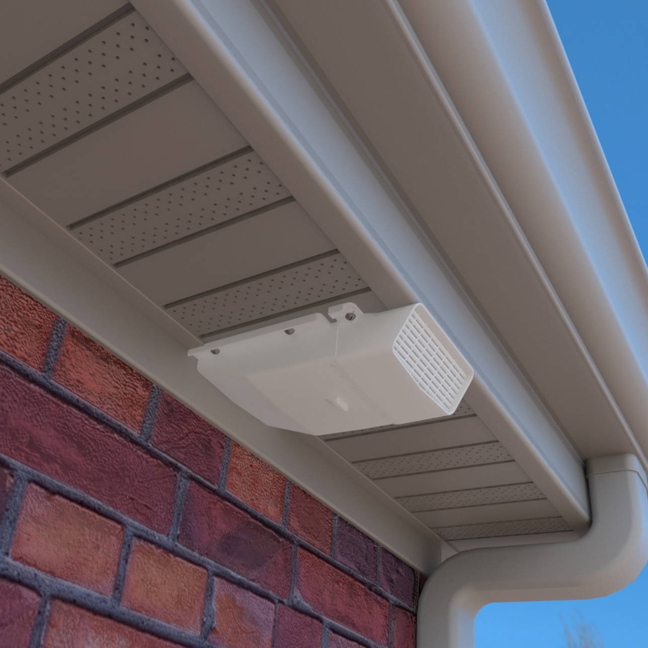 An under-eave soffit vent installed on a house to direct moisture from a bathroom fan away from the home
