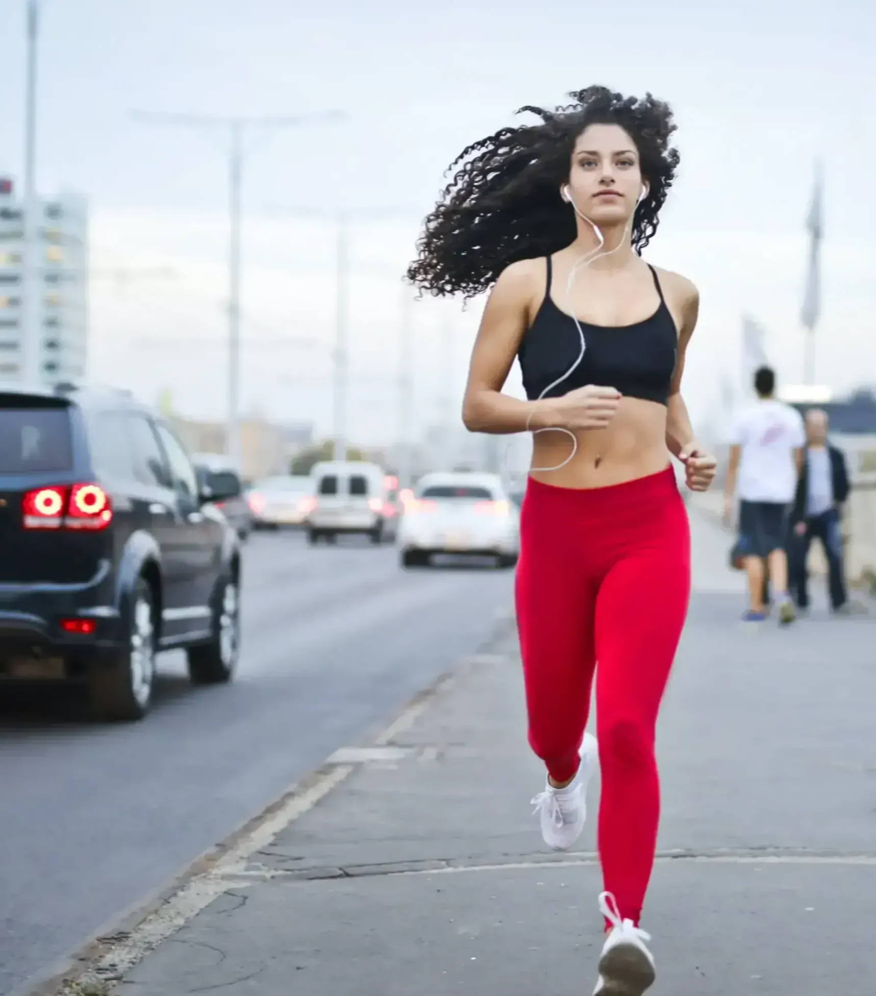 Woman running with earphones