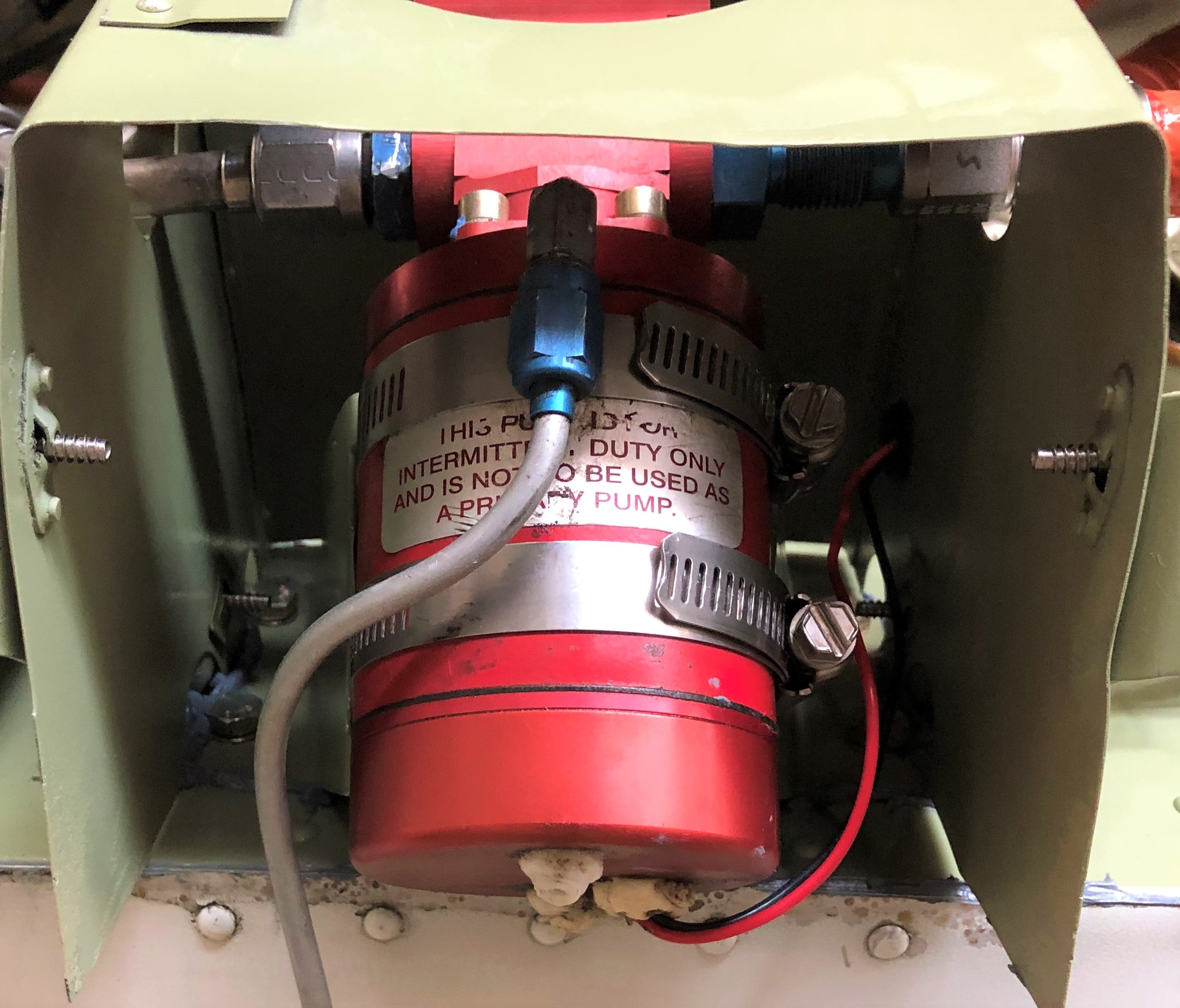 Fuel boost pump in its bay
