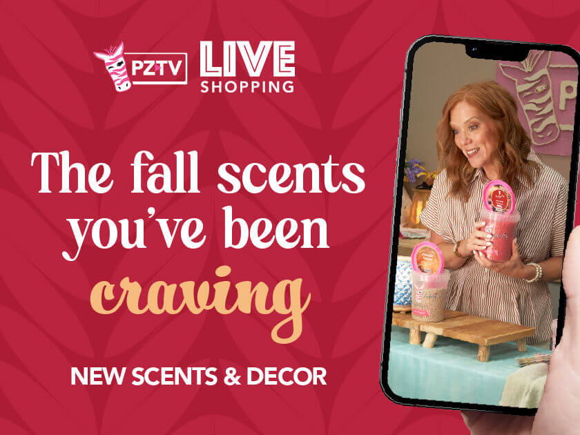 A woman showcasing fall scents and decor in a live shopping event.
