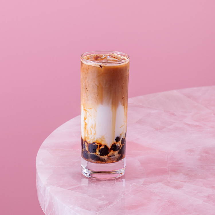 Spanish coffee bubble tea drink on pink background