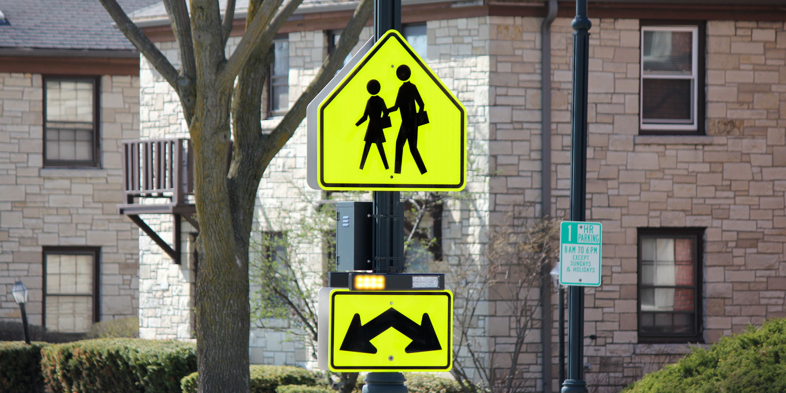 School-zone crossing with flashing BlinkerSign and RRFBs