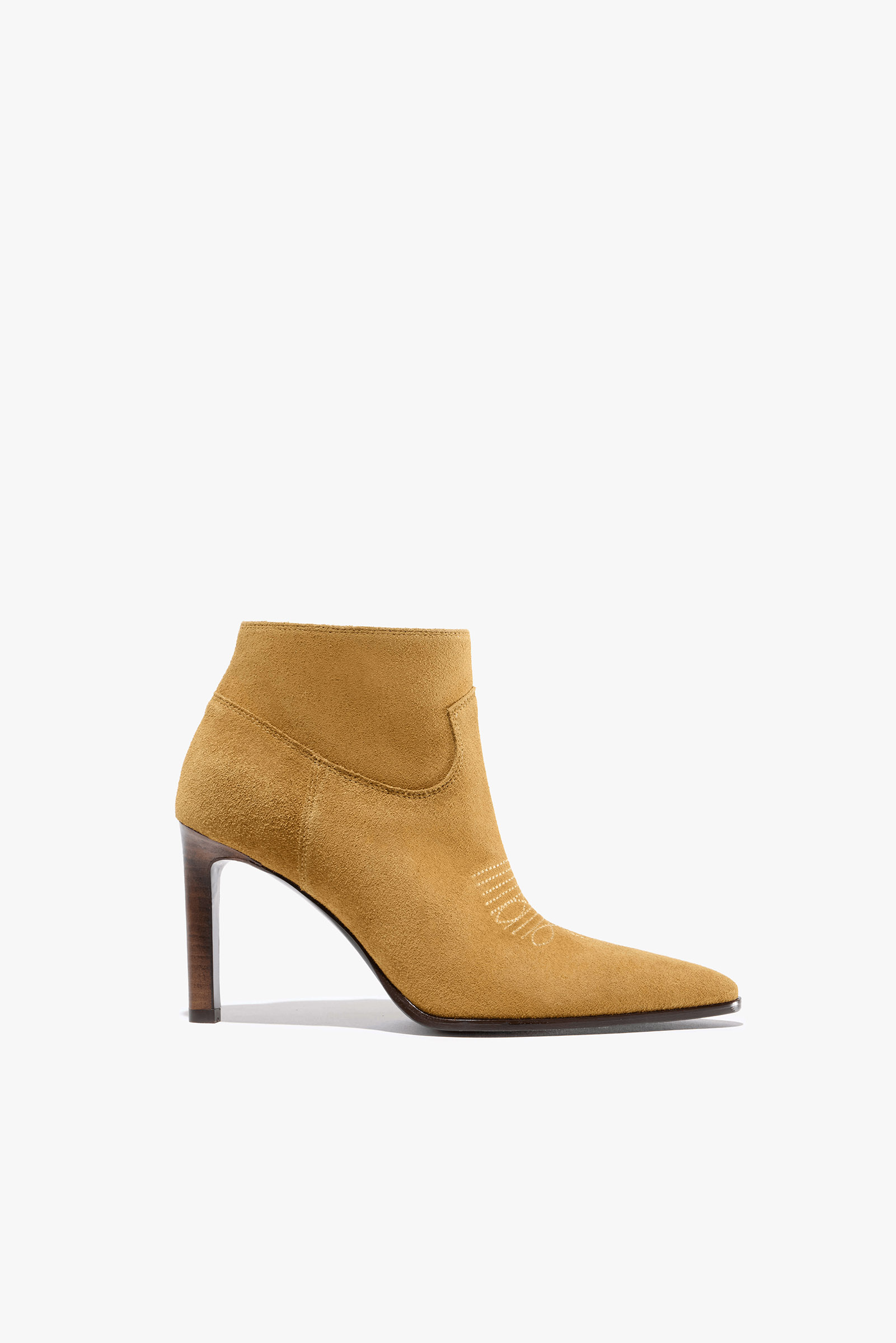 A stylish yellow suede ankle boot with a pointed toe and high heel.