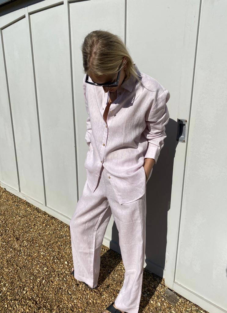 Lauren wearing pale pink linen pyjamas