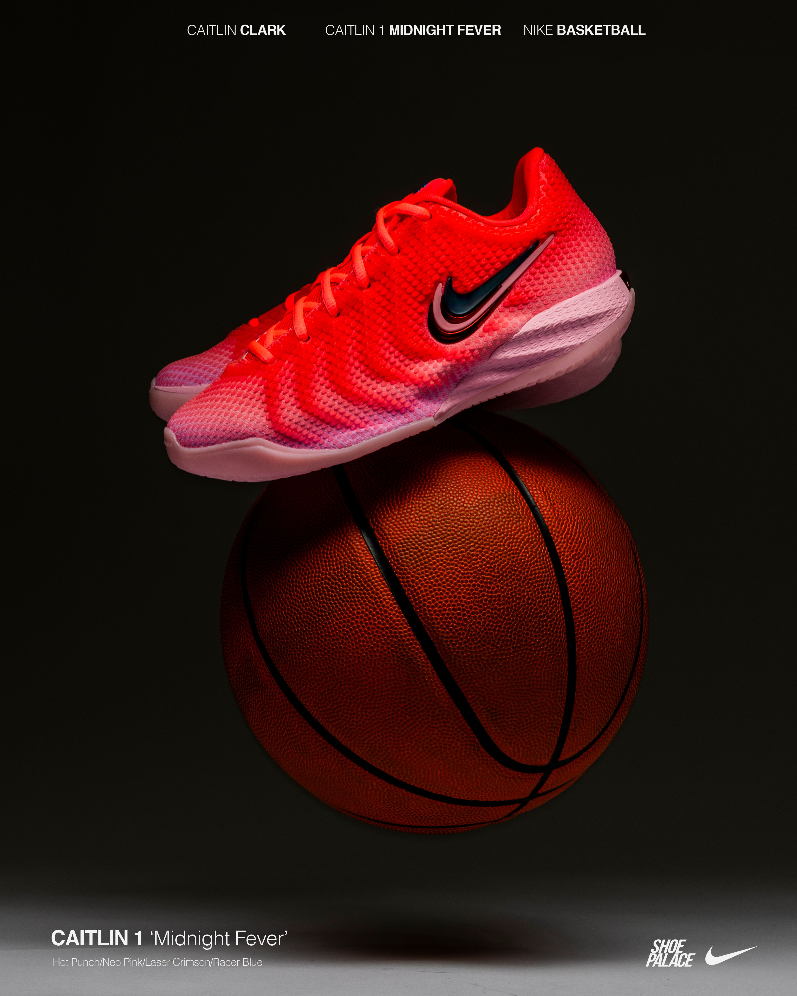 Pink basketball shoes resting on a basketball, showcasing athletic footwear design.