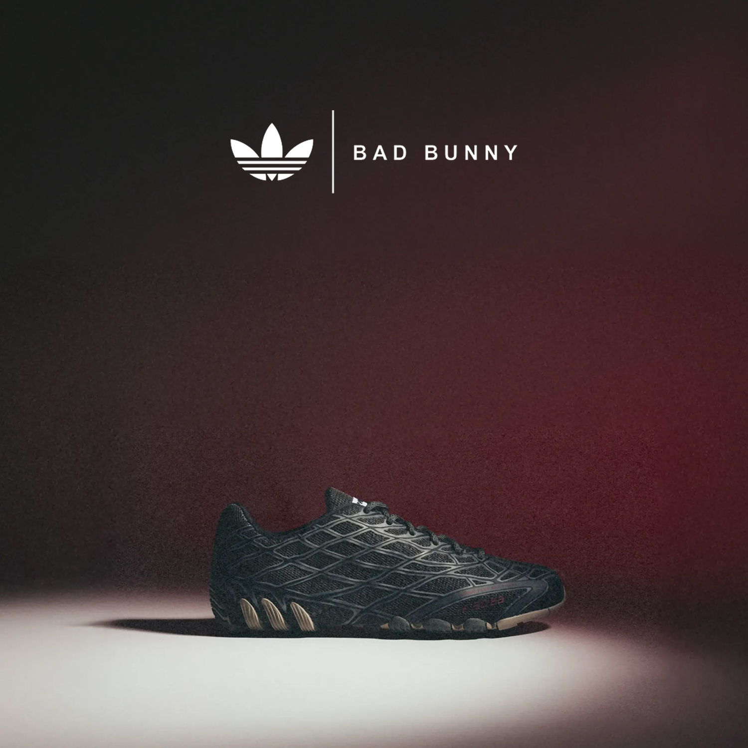 Adidas shoe featuring Bad Bunny branding on a dark background.