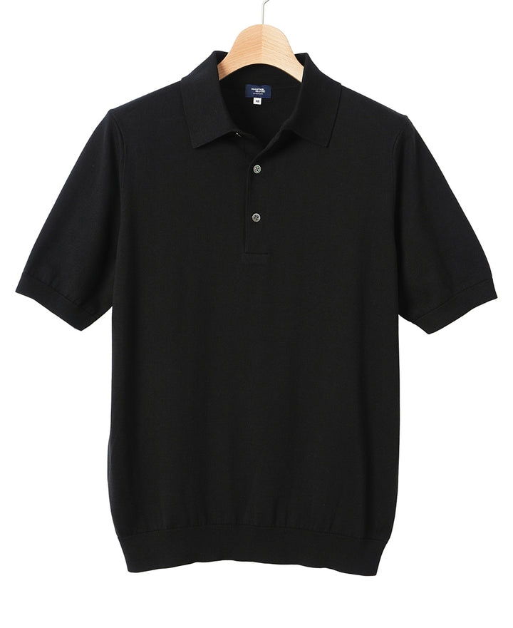 Black short-sleeve polo shirt on a hanger.