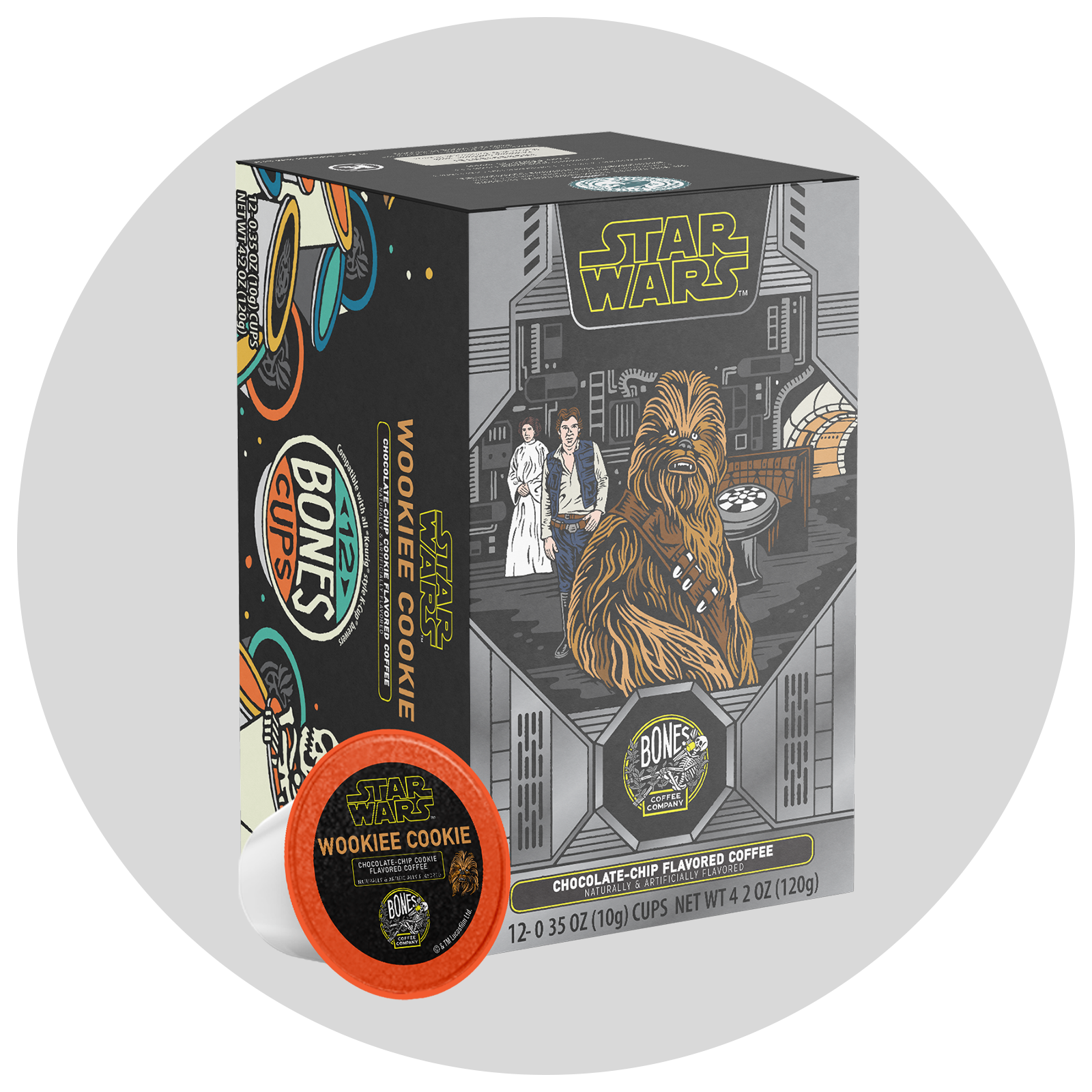 The front of the Bones Coffee Company Wookiee Cookie 12 Count Bones Cups box. Its flavor is chocolate chip cookie, and its art shows Chewy, Han Solo, and Leia on it. Behind it is a gray circle.