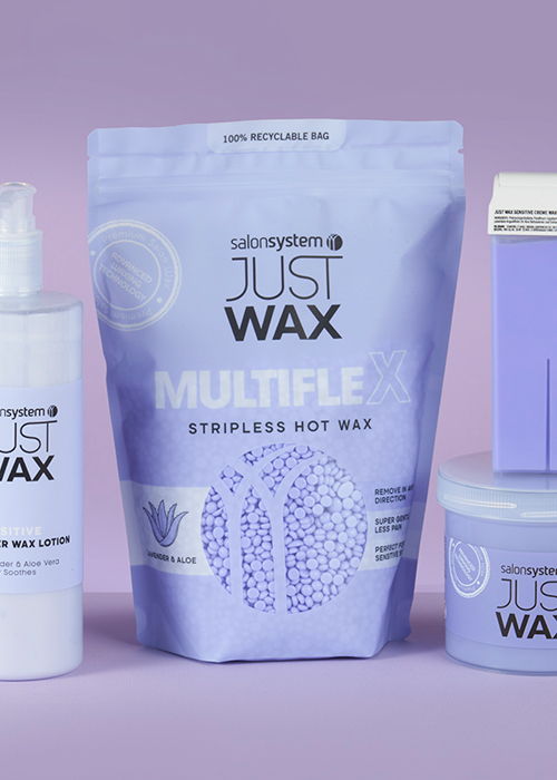 Products for hair removal, including wax and lotion, on a purple background.