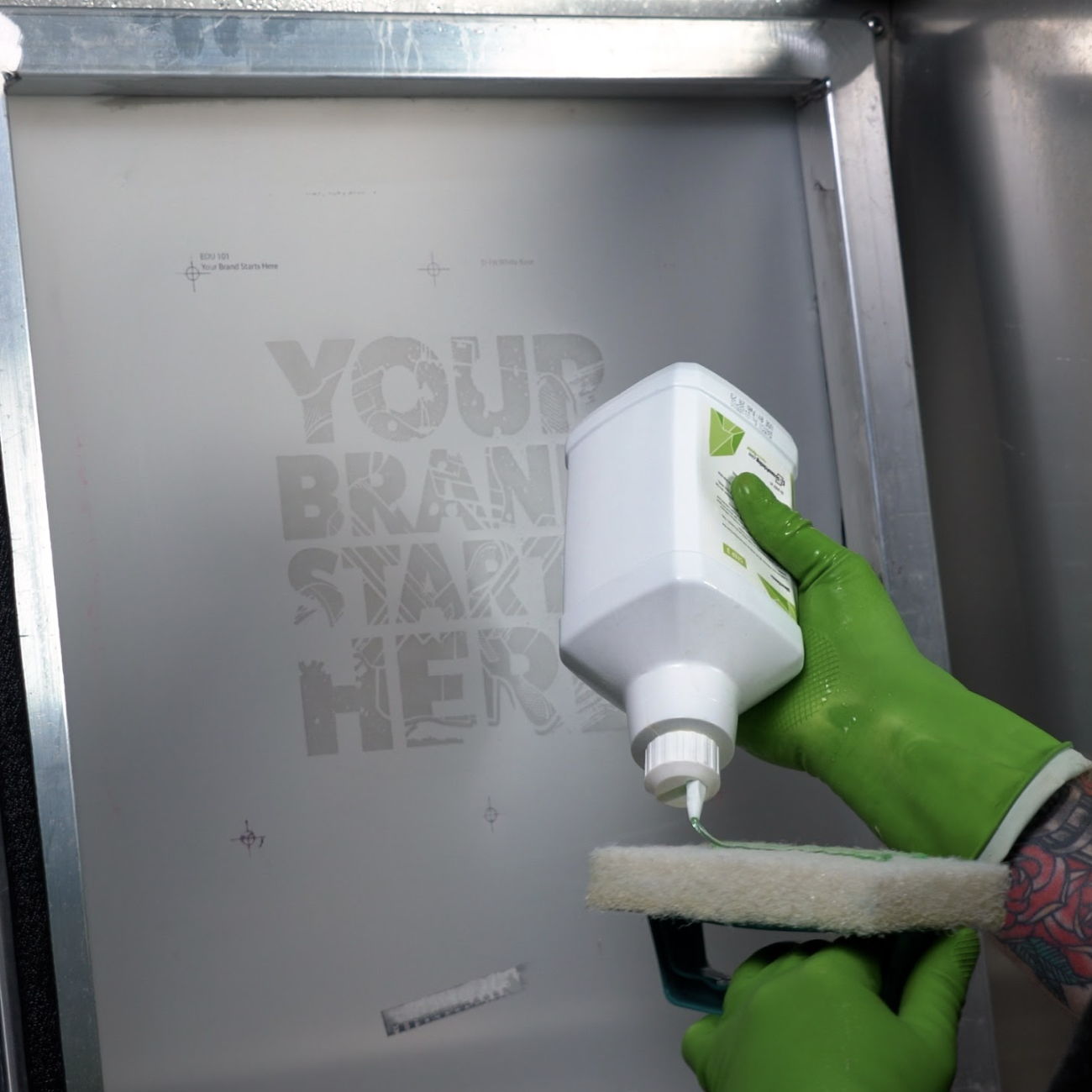 Cleaning Chemistry Being Applied to a Screen