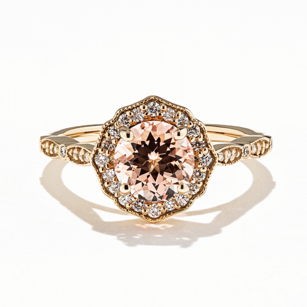 Paris inspired vintage engagement ring with diamond halo and lab created champagne sapphire pink center stone 