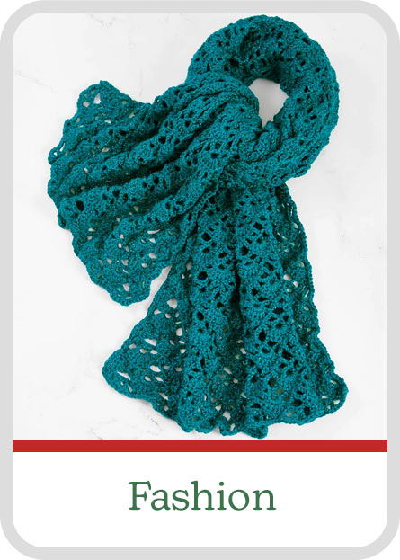 Teal crocheted scarf with a delicate lace pattern. Fashion
