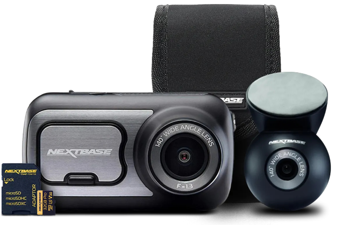 Camera with accessories including a lens, memory card, and protective case.