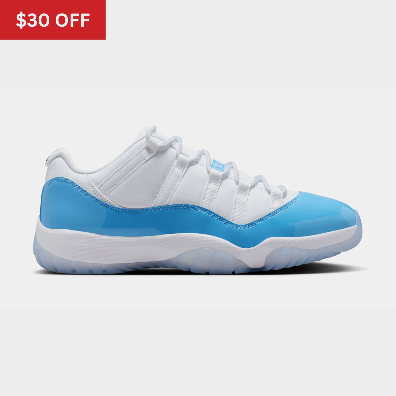 Blue and white athletic shoes with a discount tag.