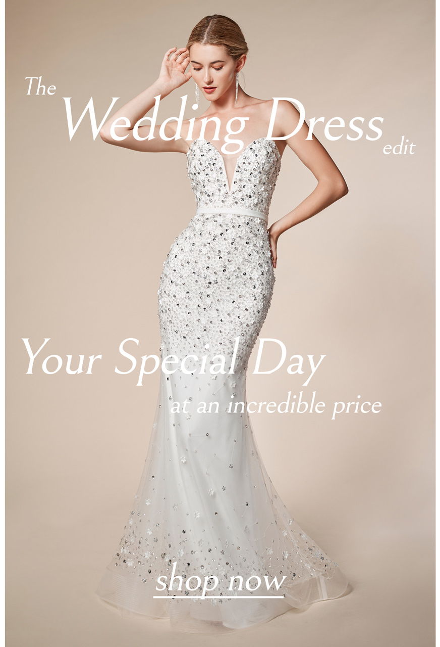 Woman in a beaded white tulle wedding dress:The wedding dress edit.Your special day at an incredible price.Wedding Dresses