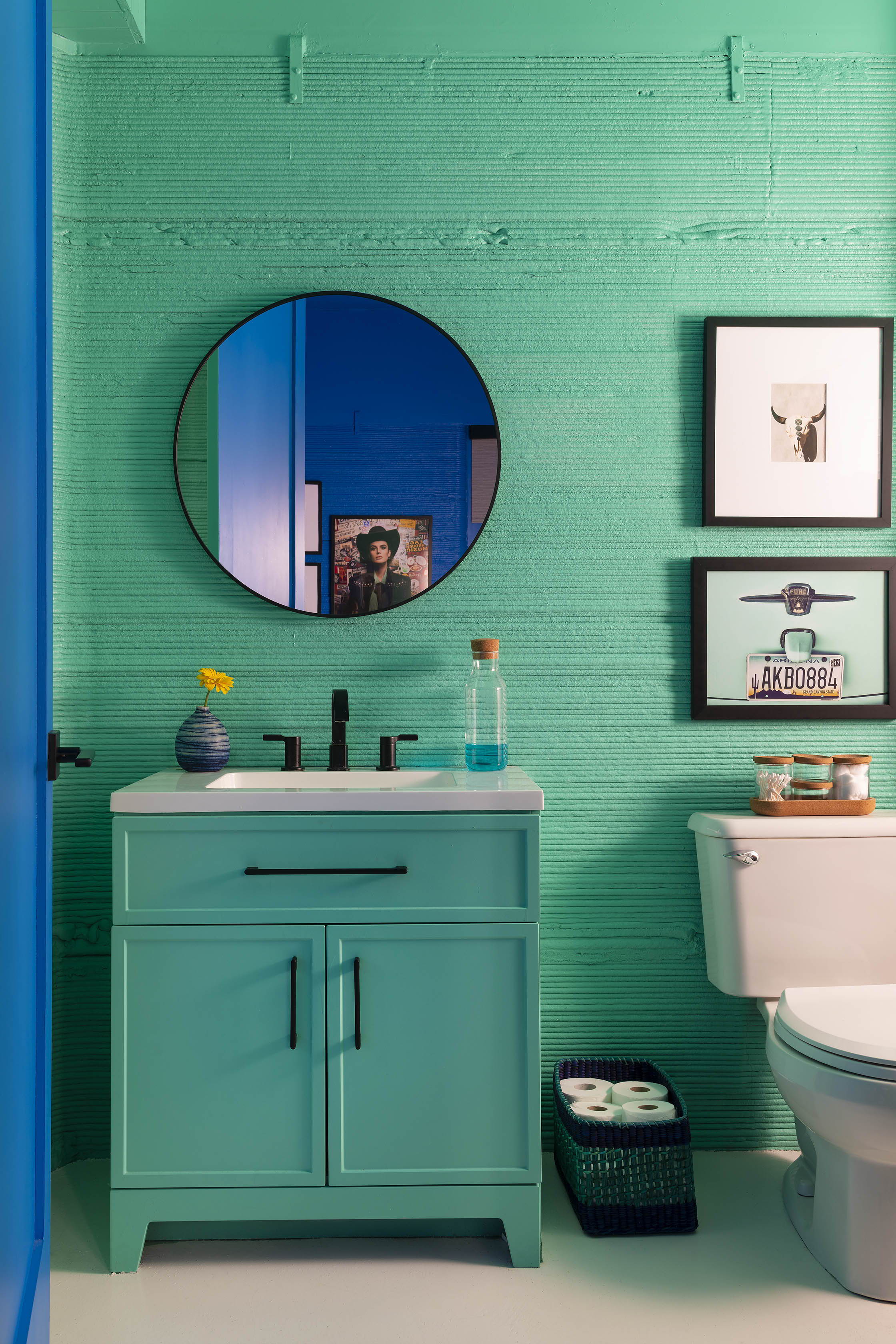 Green bathroom in the DDR Casita at The Halles in Round Top, Texas.