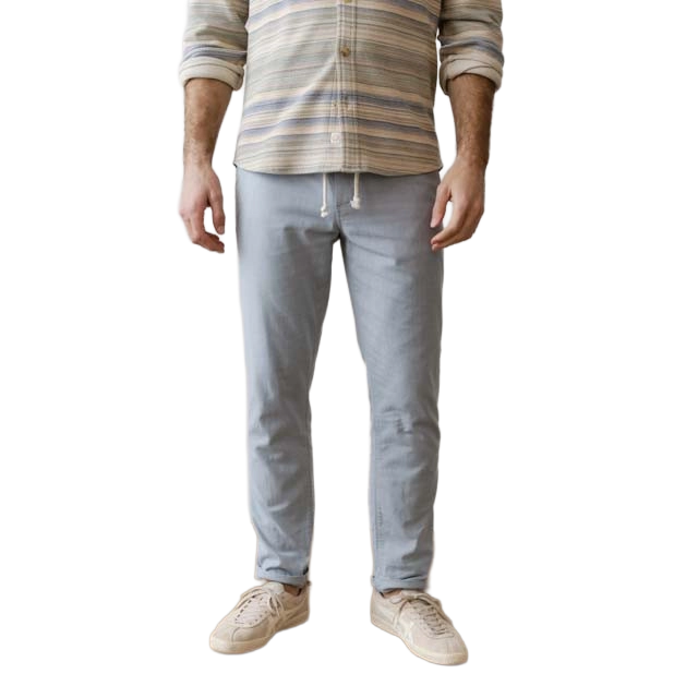 A person wearing a striped shirt and light pants, standing upright.