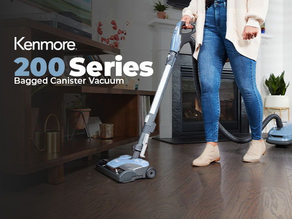 Kenmore 200 Series Bagged Canister Vacuum being used on hardwood floor.